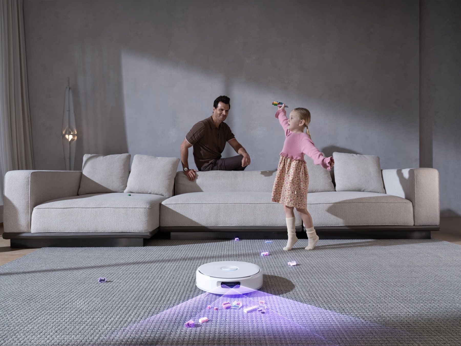 Narwal Flow 2 White recognizing toys on a living room rug