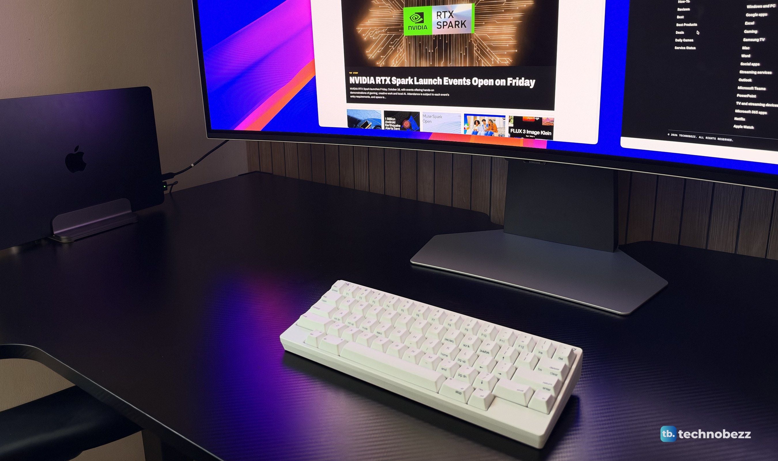 HHKB on a black desk in front of a curved ultrawide monitor, with a MacBook in a vertical stand