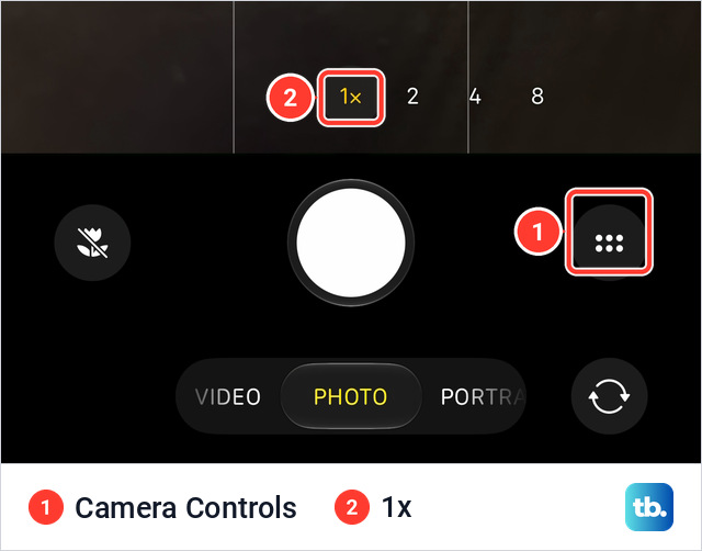 Bottom of the Camera screen on an iPhone 18 Pro Max in Photo mode, with a round six-dot button to the right of the white Shutter button and 1x selected in the zoom control