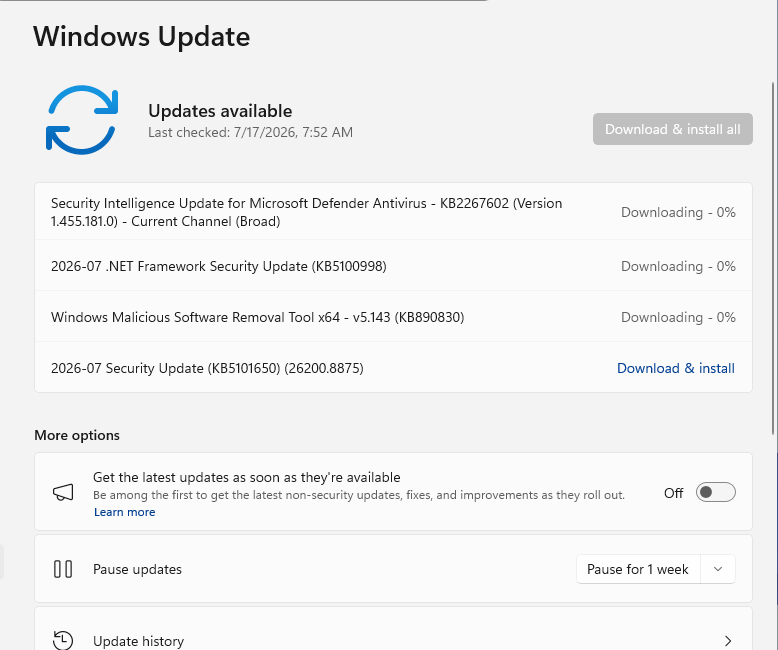 Windows 11 Settings Windows Update page listing available updates, Pause updates and Update history