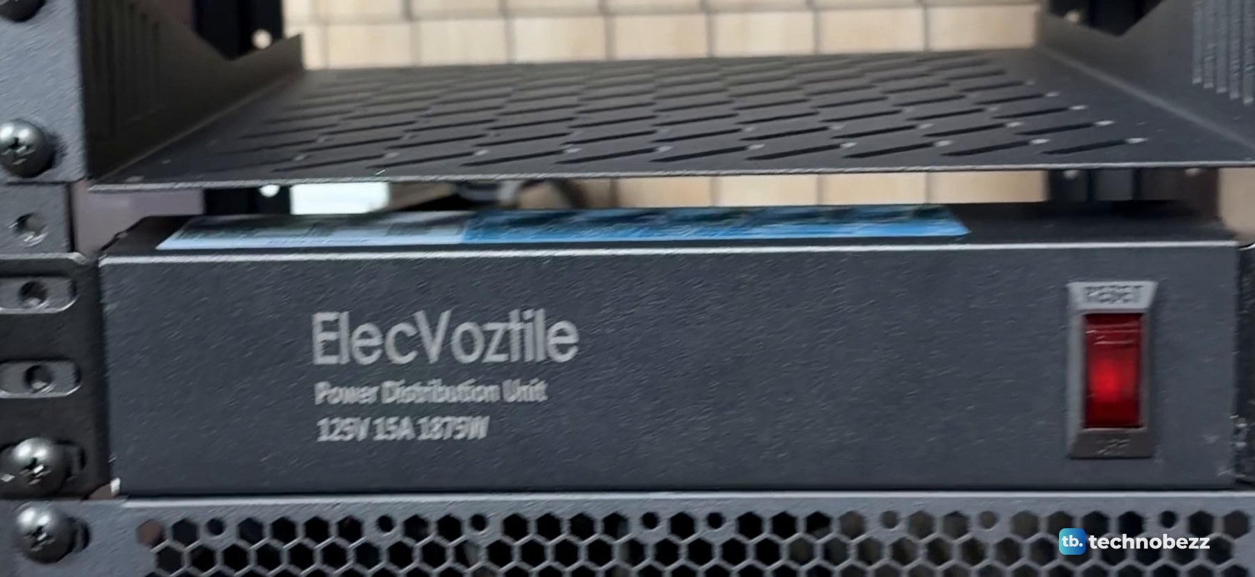 ElecVoztile 10-inch power distribution unit with a red front switch above a vented rack panel