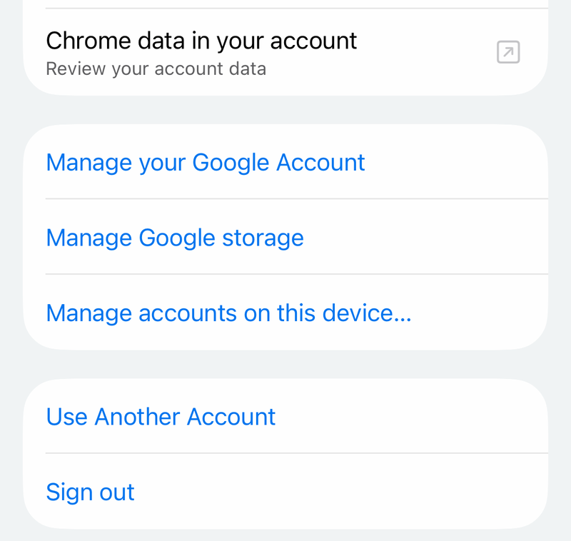 Chrome Account screen on iPhone with Manage your Google Account, Use Another Account and Sign out