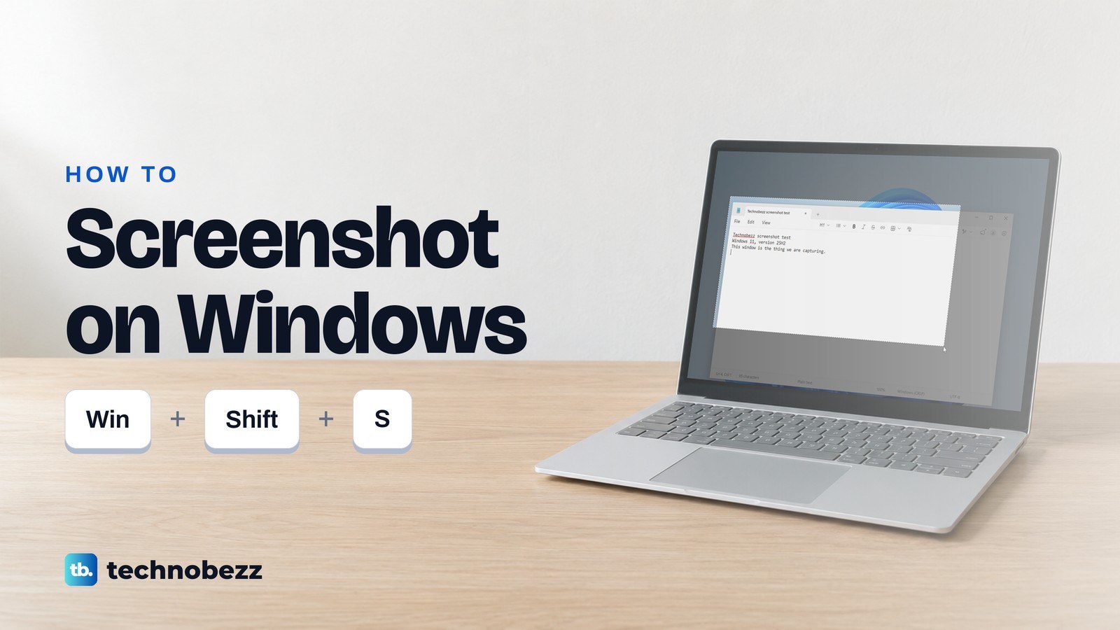 A laptop on a desk beside the words How to Screenshot on Windows and three keys labelled Win, Shift and S.