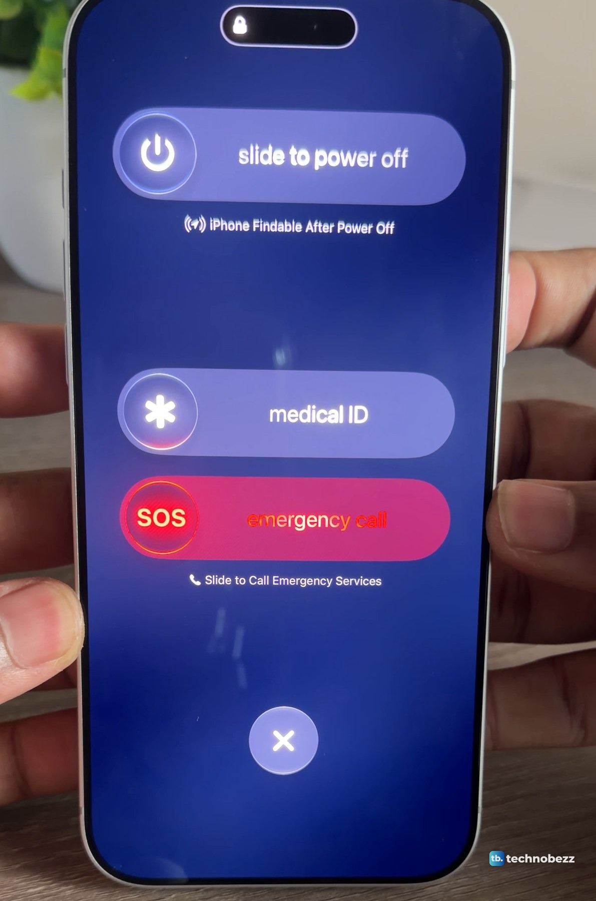 The iPhone 18 Pro Max slider screen with slide to power off at the top, iPhone Findable After Power Off under it, a medical ID slider, a red SOS emergency call slider and an X button near the bottom