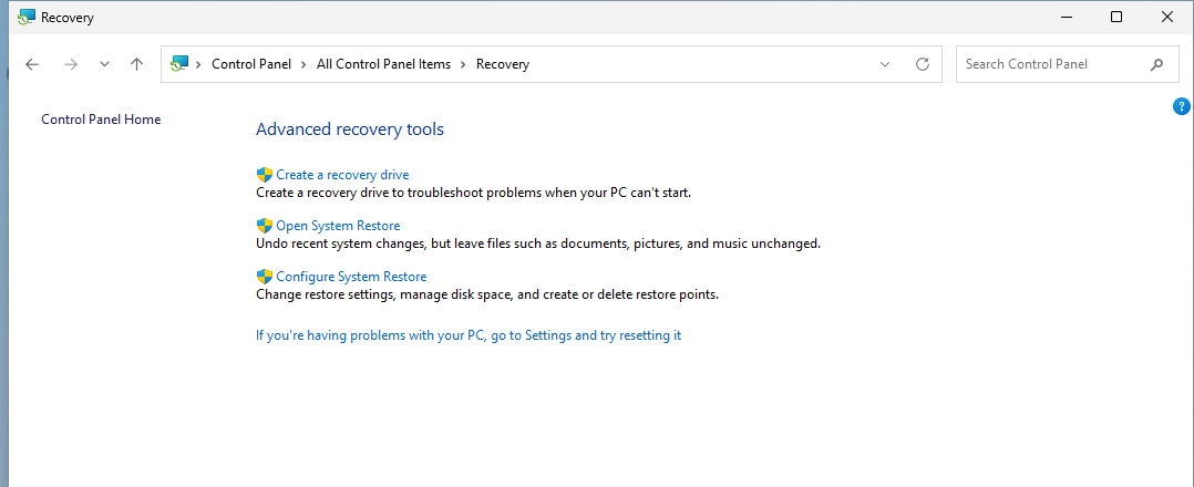 Windows 11 Control Panel Recovery Advanced recovery tools with Create a recovery drive and Open System Restore