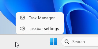 Windows 11 taskbar right-click menu with Task Manager and Taskbar settings