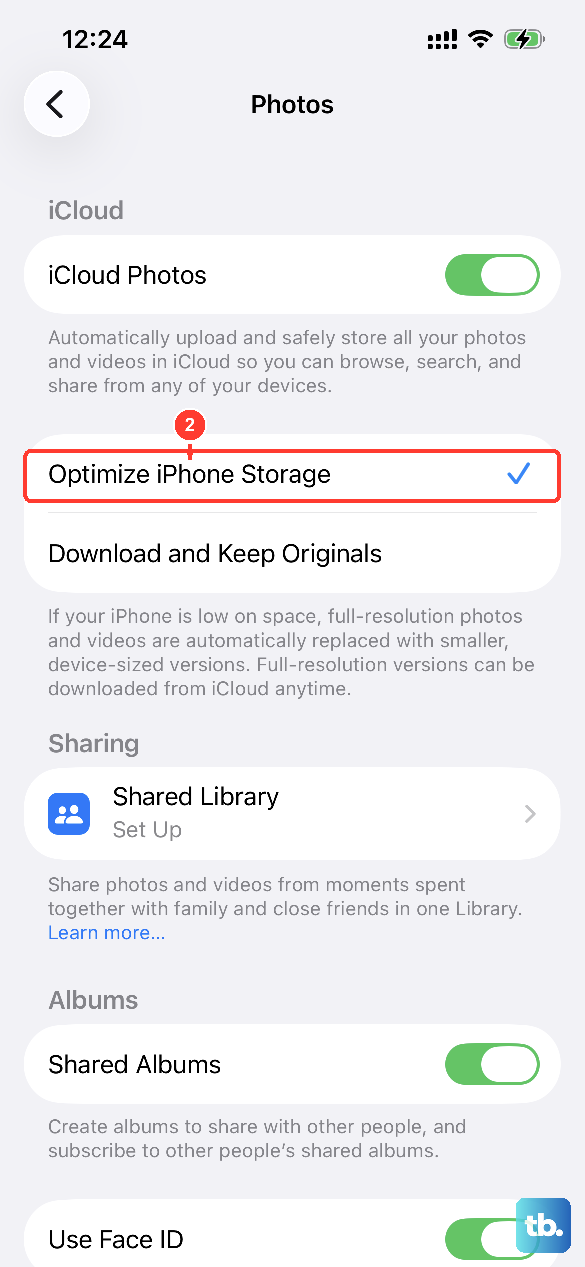 Open Settings > Photos and choose Optimize iPhone Storage so full-resolution photos move to iCloud and free up local space.