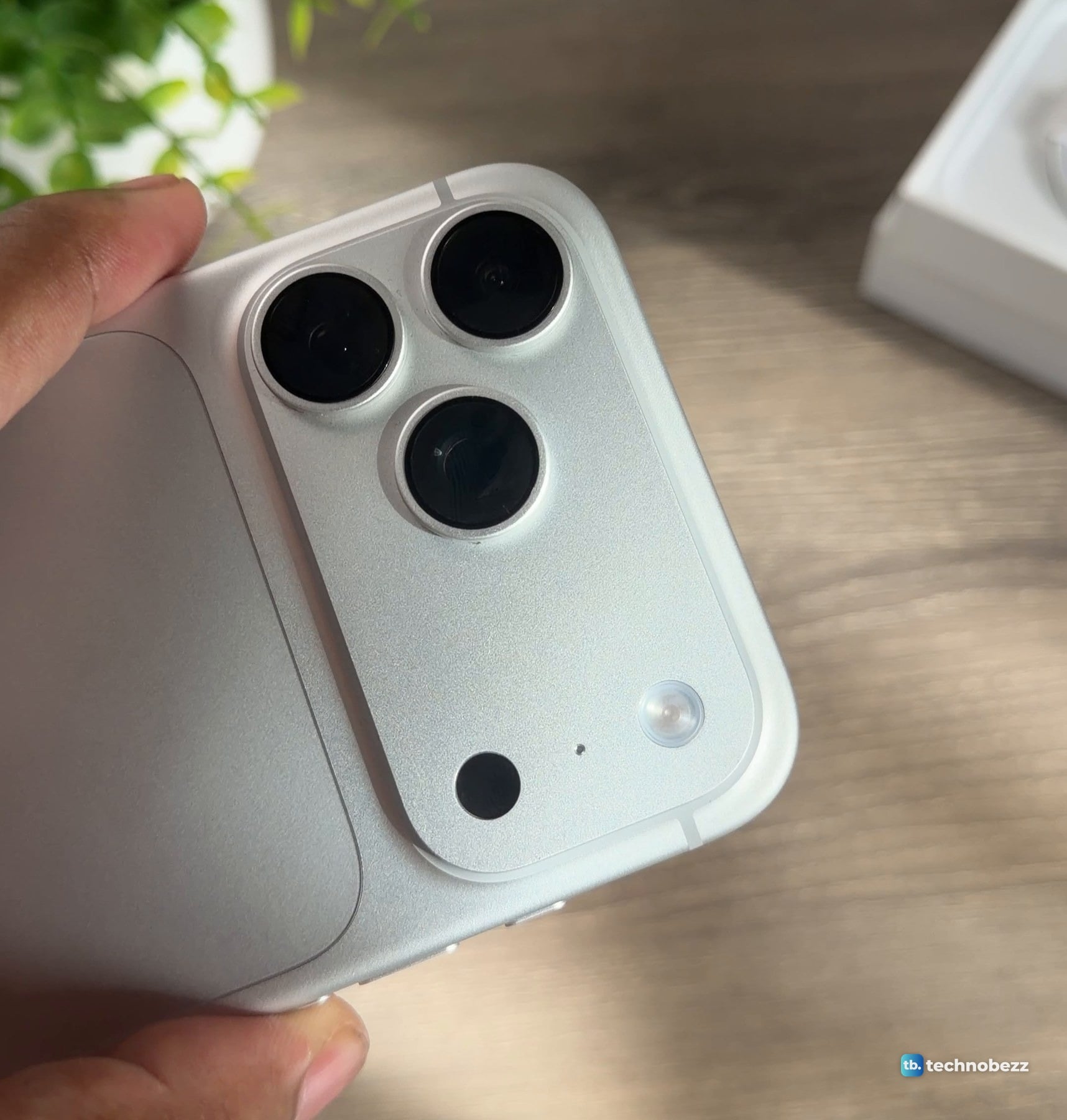 Close-up of the iPhone 18 Pro Max camera bar showing three lenses, the flash, a pinhole and a dark round window