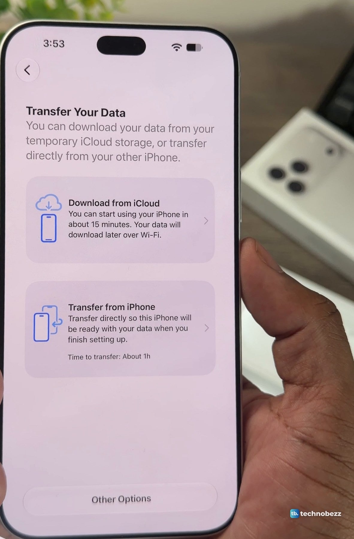 iPhone 18 Pro Max showing the Transfer Your Data screen with Download from iCloud and Transfer from iPhone options