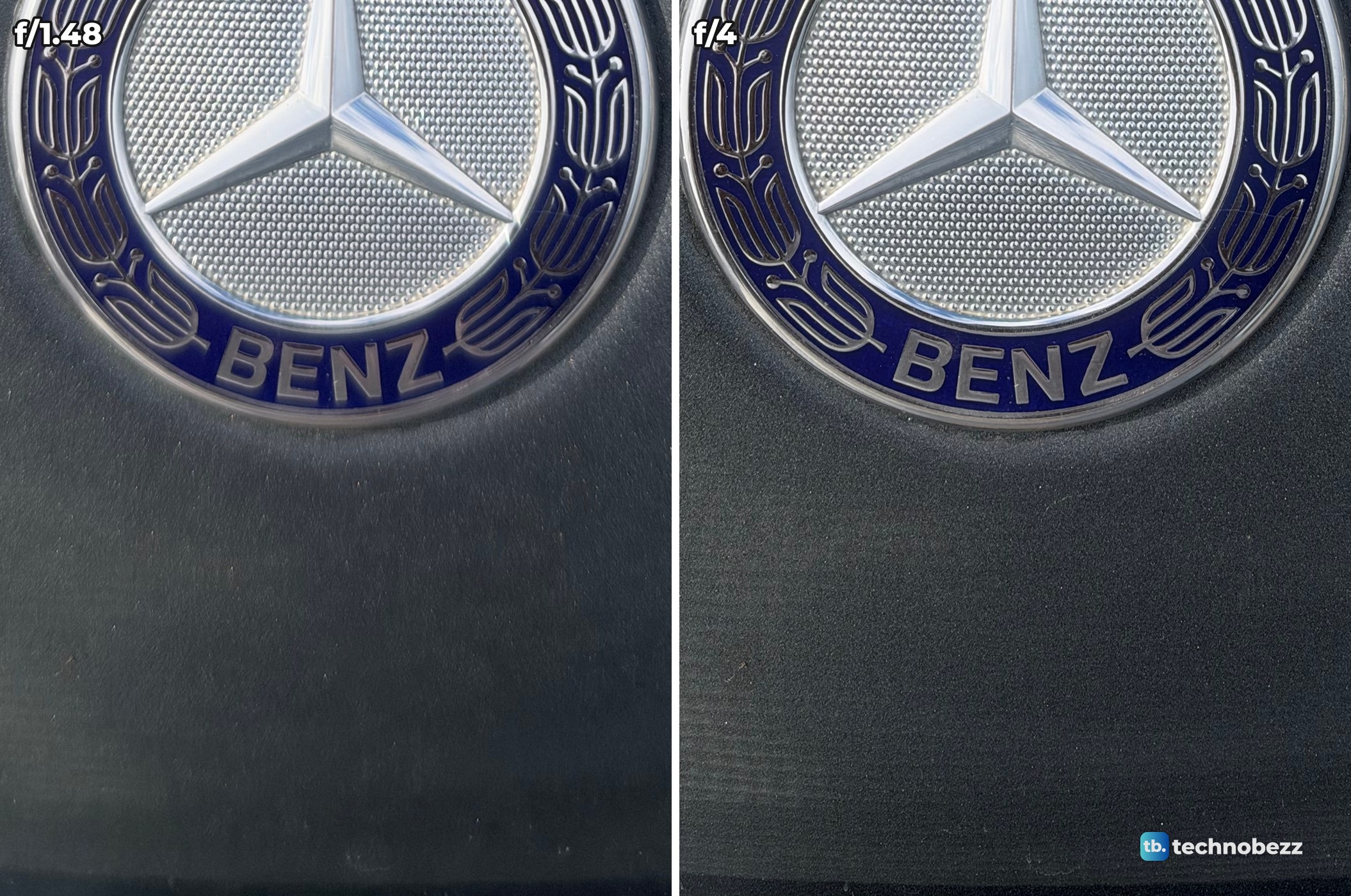 Lower half of a Mercedes-Benz hood badge and the gray paint in front of it, shot on iPhone 18 Pro Max at f/1.48 and at f/4