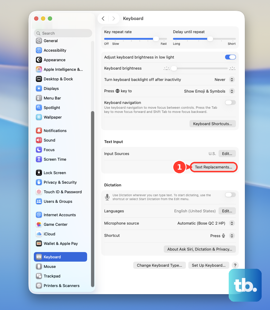 In System Settings > Keyboard, click Text Replacements…