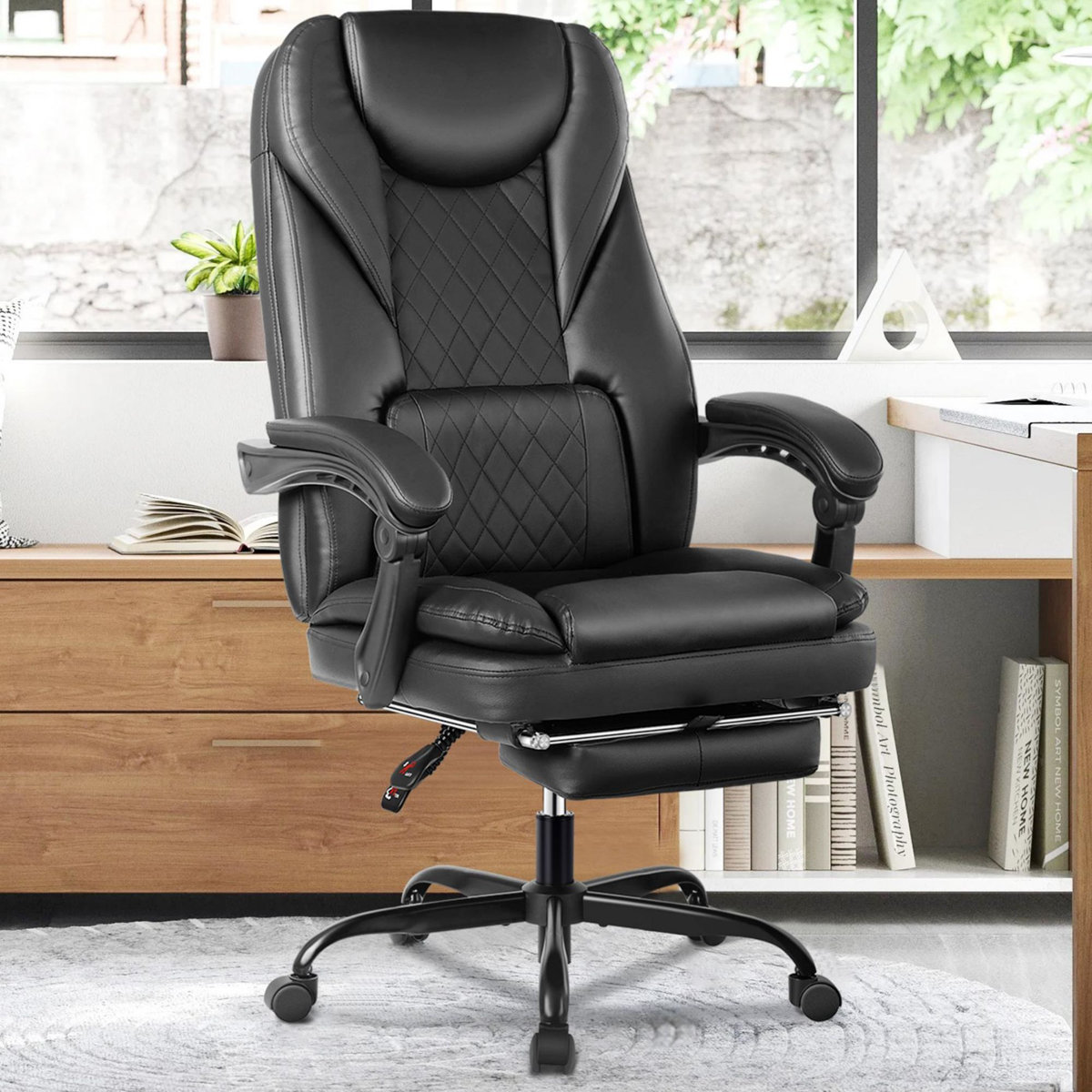 Latitude Run Azteca ergonomic executive chair with retractable footrest Black