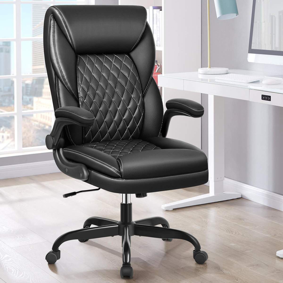 Latitude Run Marama ergonomic leather office chair with flip-up armrests Black